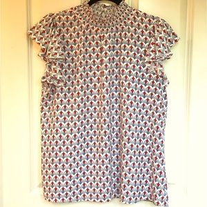 THML sleeveless top in size L.